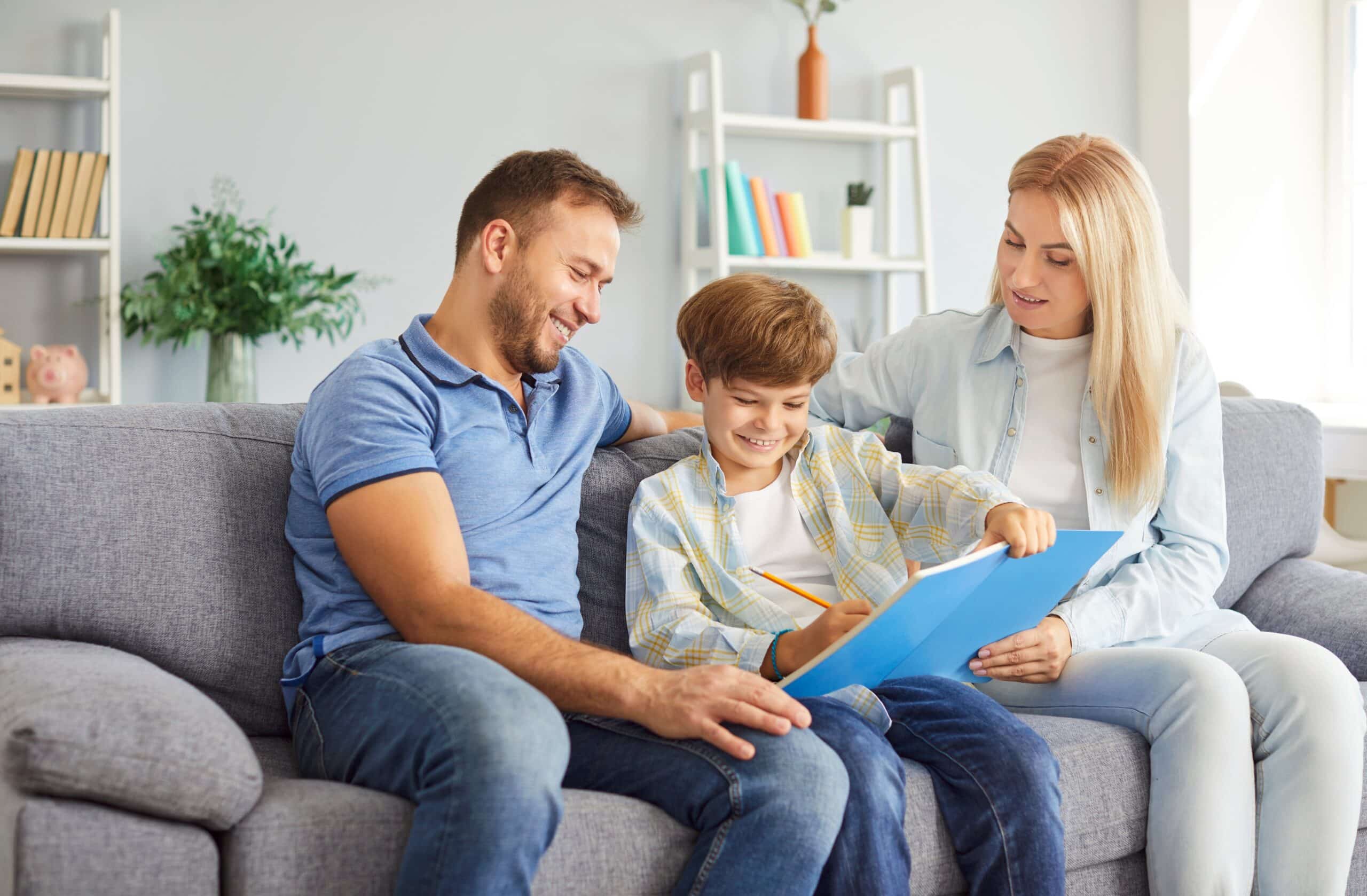 Raising Grateful Children: How to Teach Gratitude at Home and School 1 Parent and child journaling together at home, sharing gratitude as part of a daily family tradition.